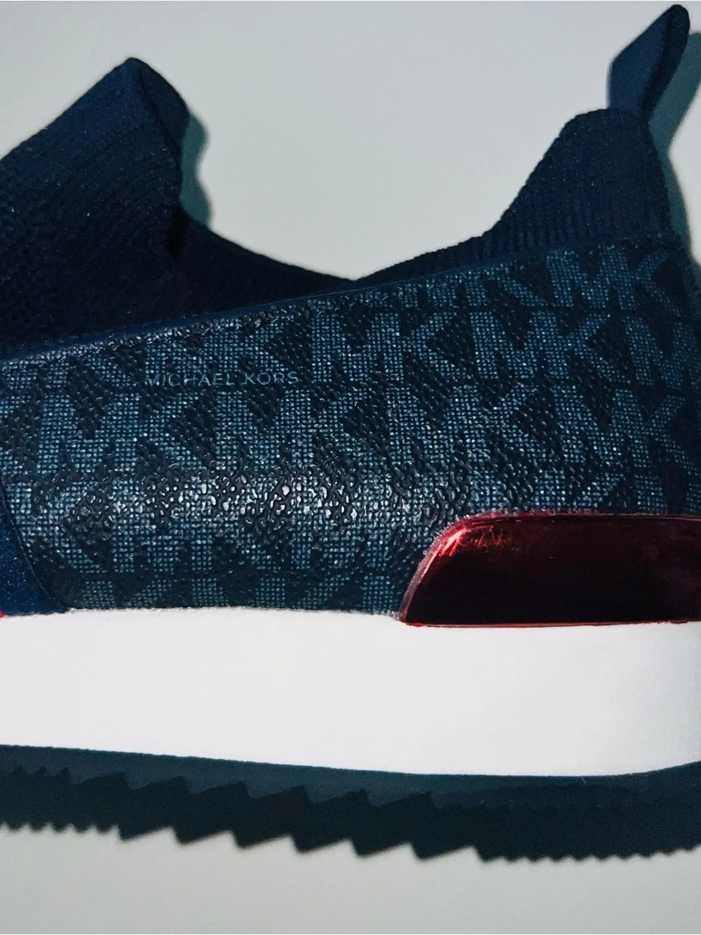 Michael Kors Women’s Blue Slip-On Sneakers with Red Logo Band